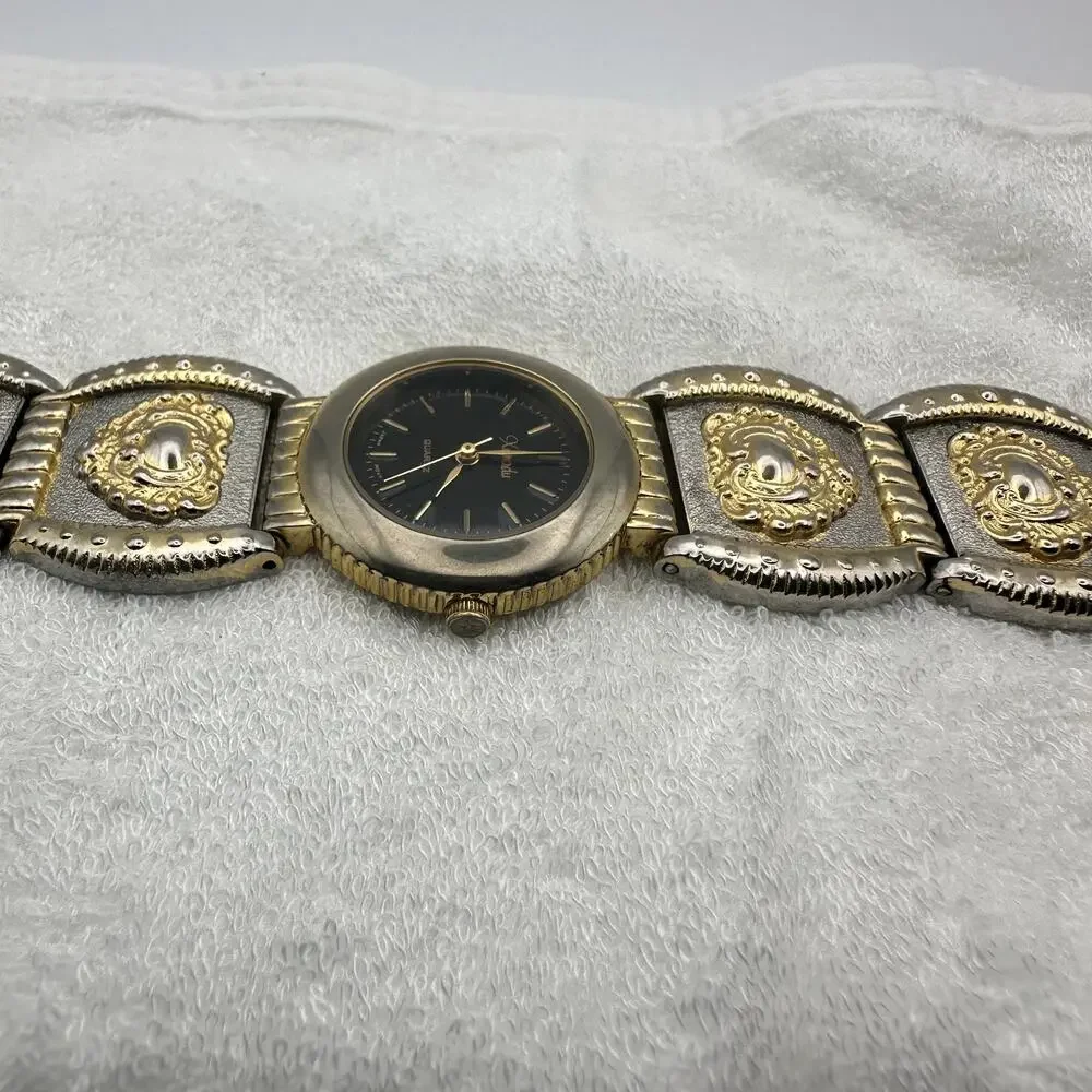 Xanadu Quartz Watch Two Tone Gold Silver Ornate Link Bracelet Black Dial